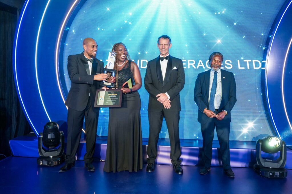 Eswatini Beverages Managing Director Doreen Tumureebire poses with her award during the 4th Annual ERS Client Appreciation Day held at the Happy Valley Hotel in Ezulwini.