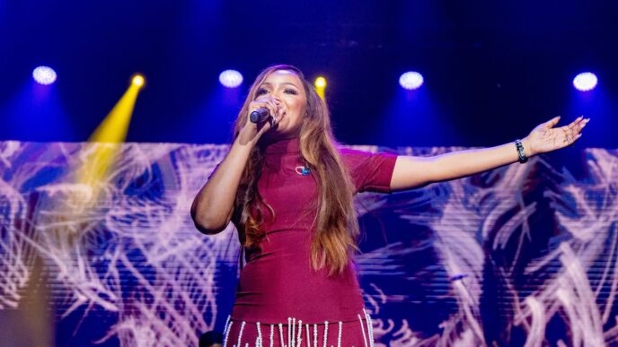 Nothando Hlophe delivers a powerful performance at the Spirit of Praise 12 Live Recording at the sold out SunBet Arena in Pretoria on Saturday, 18 July 2026. (Photo: Nothando Hlophe/Facebook)