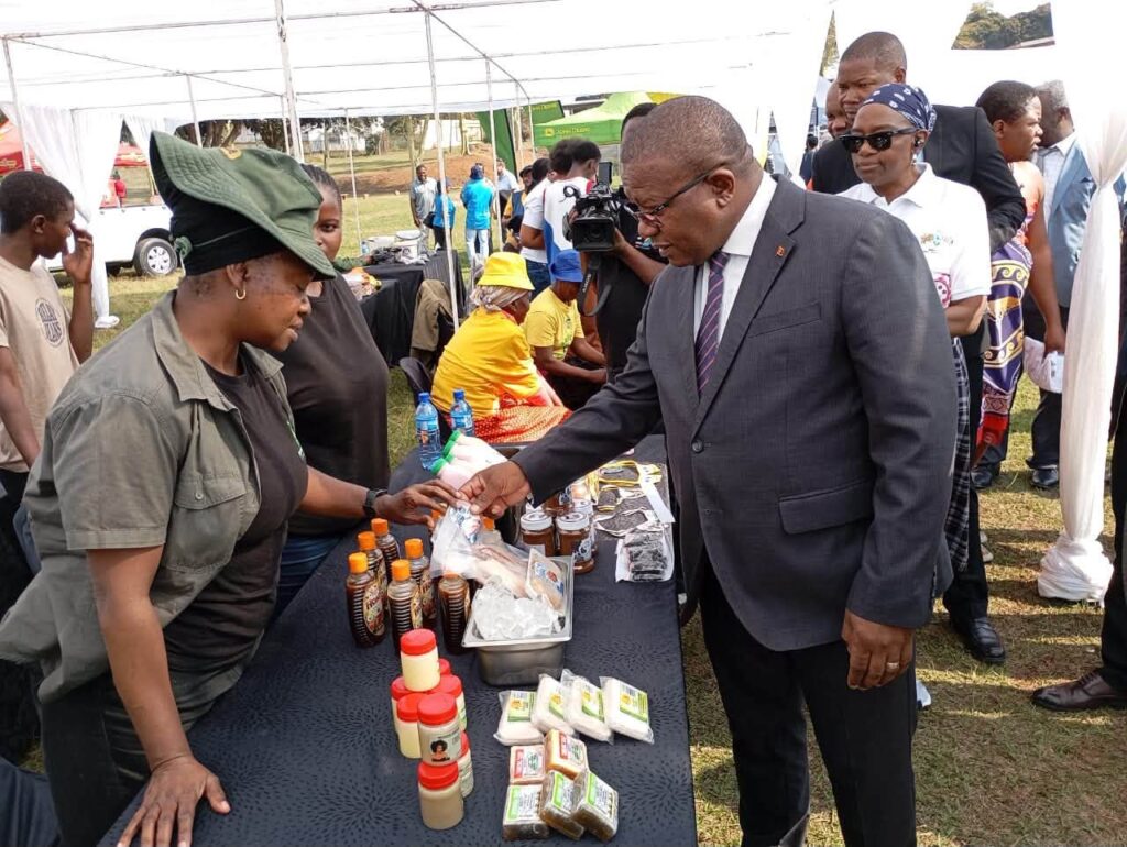 Minister Manqoba Khumalo engages exhibitors at their stalls during the International Cooperative Day 2026 commemoration