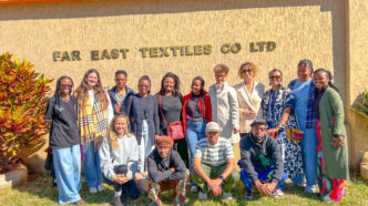 Far East Textiles Founder and Managing Director Tokky Hou with some of the eleven designers during the factory visit at Matsapha.