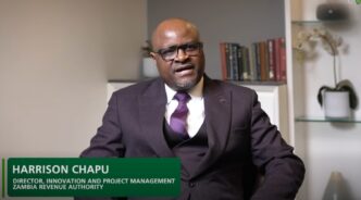 Mr Harrison Chapu, Director of Innovation and Project Management at the Zambia Revenue Authority, speaks on the African developed AEOI IT System in a video released by the African Tax Administration Forum. (Photo: Screengrab from ATAF video)