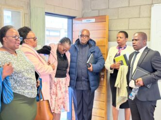 Ministry of Public Service PS Mthunzi Shabangu with his team being taken through the IDM/EIMPA Campus in Kwaluseni.