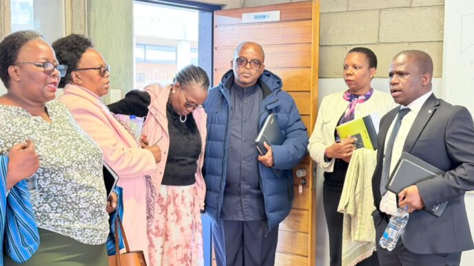 Ministry of Public Service PS Mthunzi Shabangu with his team being taken through the IDM/EIMPA Campus in Kwaluseni.