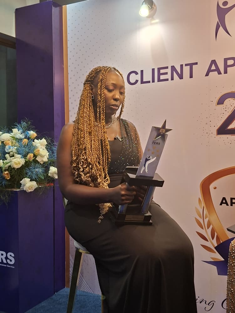 Eswatini Beverages Managing Director Doreen Tumureebire poses with her award during the 4th Annual ERS Client Appreciation Day held at the Happy Valley Hotel in Ezulwini.