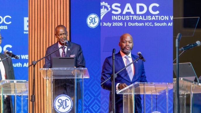 SADC Executive Secretary His Excellency Mr. Elias Magosi and AfCFTA Secretary General Wamkele Keabetswe Mene, joined by two other stakeholders, at the 9th Annual SADC Industrialisation Week in Durban. Photo by SADC