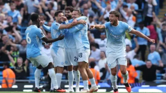 Manchester City scored two late goals to defeat Bournemouth in their Premier League opener (Getty)