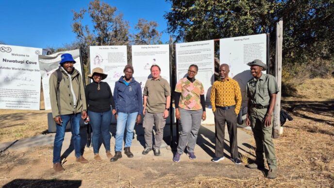 Participants from Botswana, Eswatini, Lesotho, Namibia, South Africa and Zimbabwe pictured during a site visit to Nswatugi and Pomongwe Caves in Matobo Hills, Zimbabwe, as part of a regional training programme on heritage interpretation and storytelling. | Photo: UNESCO ROSA