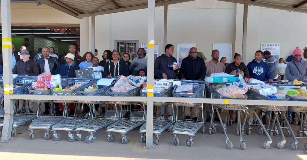 Deputy Prime Minister Thulisile Dladla poses with some of the winners during the first ever Trolley Dash for Persons with Disabilities at Mashayitafula Pick’n’Pay.