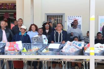 Deputy Prime Minister Thulisile Dladla poses with some of the winners during the first ever Trolley Dash for Persons with Disabilities at Mashayitafula Pick’n’Pay.
