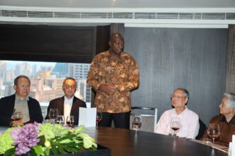 Prime Minister Russell Mmiso Dlamini engages in conversation with Tex Ray Industrial Co., Ltd. founder and chairman Ray Lin during a dinner held in Taipei, Taiwan.