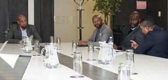 SACU Secretariat officials Katiso Ramalebo, Thuto Mathesa and Dr Abel Mboweni engage with Eswatini Revenue Service Commissioner General Brightwell Nkambule during the 2026 Intra-SACU Trade Data Audit Mission in Eswatini.