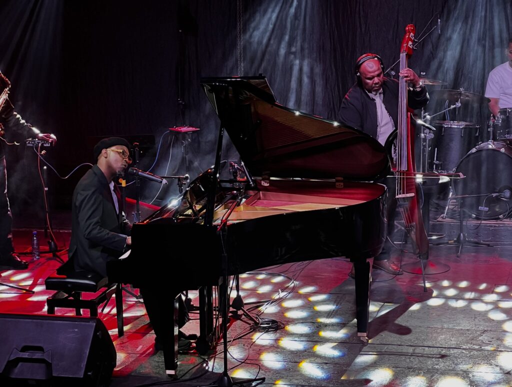Akuse Khula takes the stage with his band for an expressive performance celebrating his musical journey. 📸 Credit: Thabani Matsebula