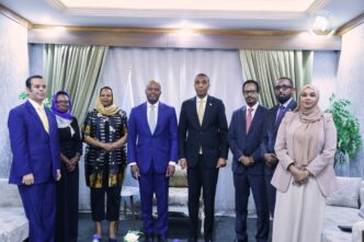 AfCFTA Secretary General Wamkele Mene poses with Somali officials and business representatives during his Mogadishu visit. 📸 Photo: AfCFTA Secretariat