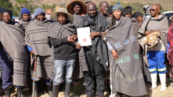 Minister of Environment and Forestry Thabo Mofosi joins pastoralists and livestock farmers for a group photograph during the commemoration of the International Year of Rangelands and Pastoralists at Ha ’Matsa, Matelile, Mafeteng, Lesotho.