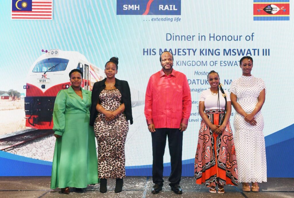 His Majesty King Mswati III poses for a photograph with some of the emaSwati students studying in Malaysia.