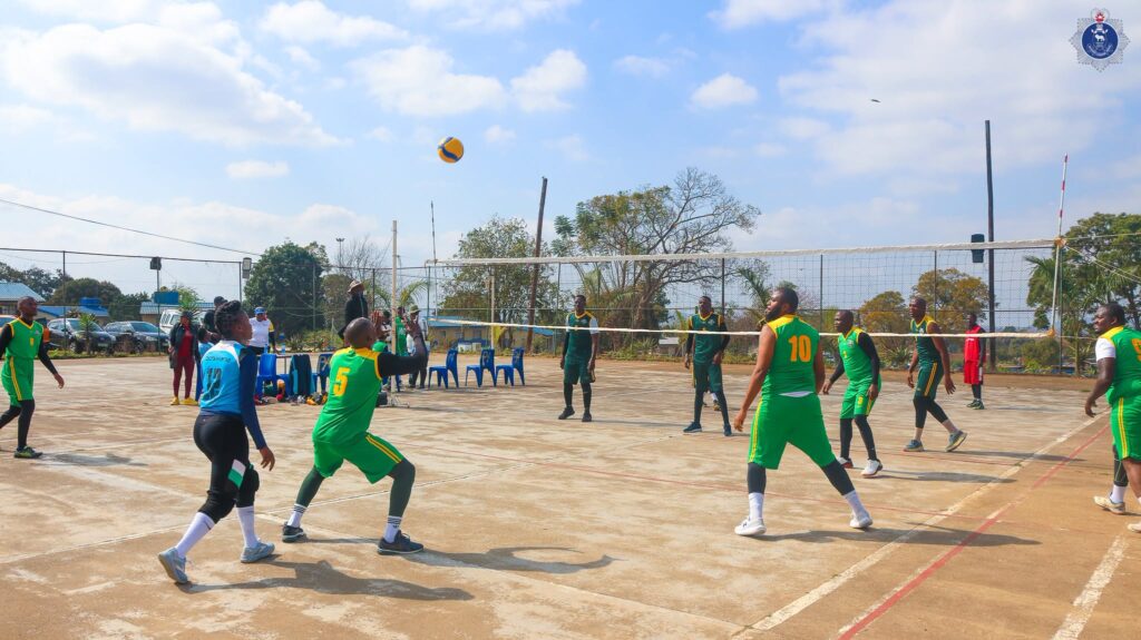 Police officers compete in volleyball during the NATCOM Cup Games at the Matsapha Police Academy.