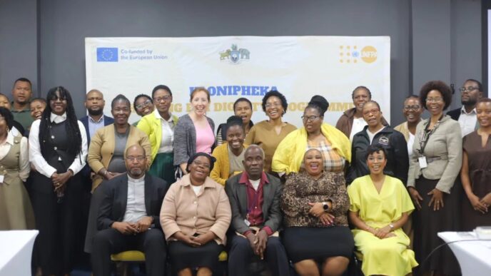 Stakeholders pose for a group photo during the validation meeting for Eswatini’s National Restorative Justice Guidelines for Gender Based Violence. Photo by DPMO
