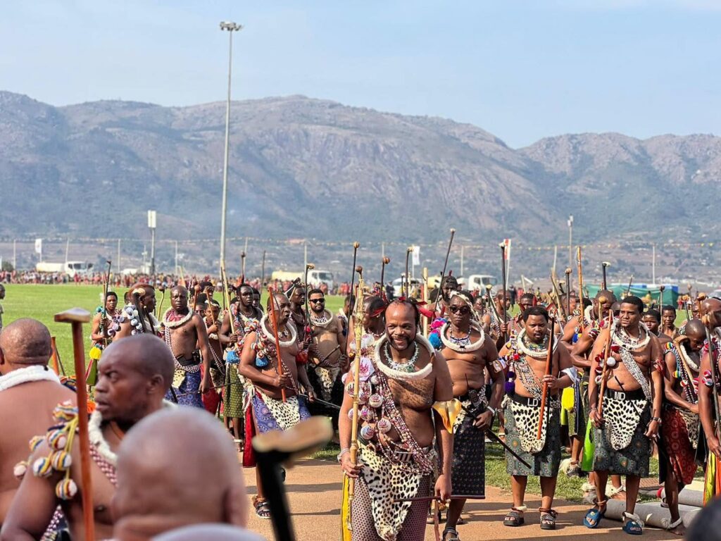 King Mswati III acknowledges the Imbali during the main day of the 2026 Umhlanga Reed Dance at Ludzidzini. Photo: Eswatini TV.