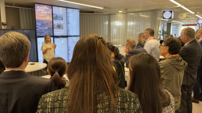 Delegates attend an unrelated media industry event organised by the World Association of News Publishers, WAN IFRA.