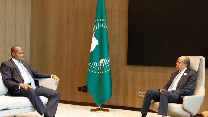 AU Commission Chairperson Mahmoud Ali Youssouf receives Prime Minister Russell Mmiso Dlamini of Eswatini during a courtesy call on the margins of the 21st Extraordinary Session of the AU Assembly in Luanda, Angola.
