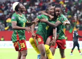 Cameroon players celebrate after scoring during their 3 to 0 victory over Malawi in the 2026 Women’s Africa Cup of Nations final in Rabat, Morocco.