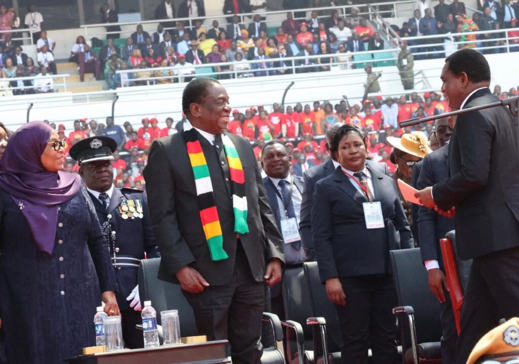 Zimbabwean President Emmerson Mnangagwa and Tanzanian President Samia Suluhu Hassan look on during President Hakainde Hichilema’s inauguration in Lusaka.