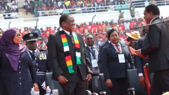 Zimbabwean President Emmerson Mnangagwa and Tanzanian President Samia Suluhu Hassan look on during President Hakainde Hichilema’s inauguration in Lusaka.