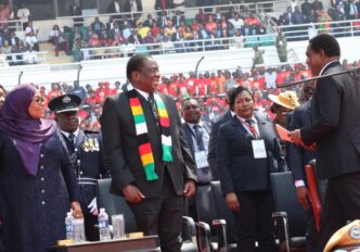 Zimbabwean President Emmerson Mnangagwa and Tanzanian President Samia Suluhu Hassan look on during President Hakainde Hichilema’s inauguration in Lusaka.