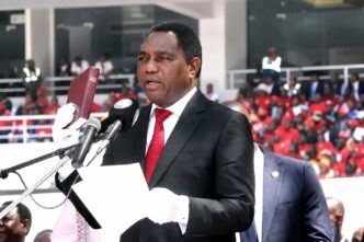 Zambian President Hakainde Hichilema takes the Oath of Office during his inauguration for a second term at the National Heroes Stadium in Lusaka