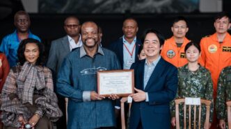 President Lai Ching-te presents King Mswati III with a certificate and command jacket during his visit to Taiwan’s aviation training centre.